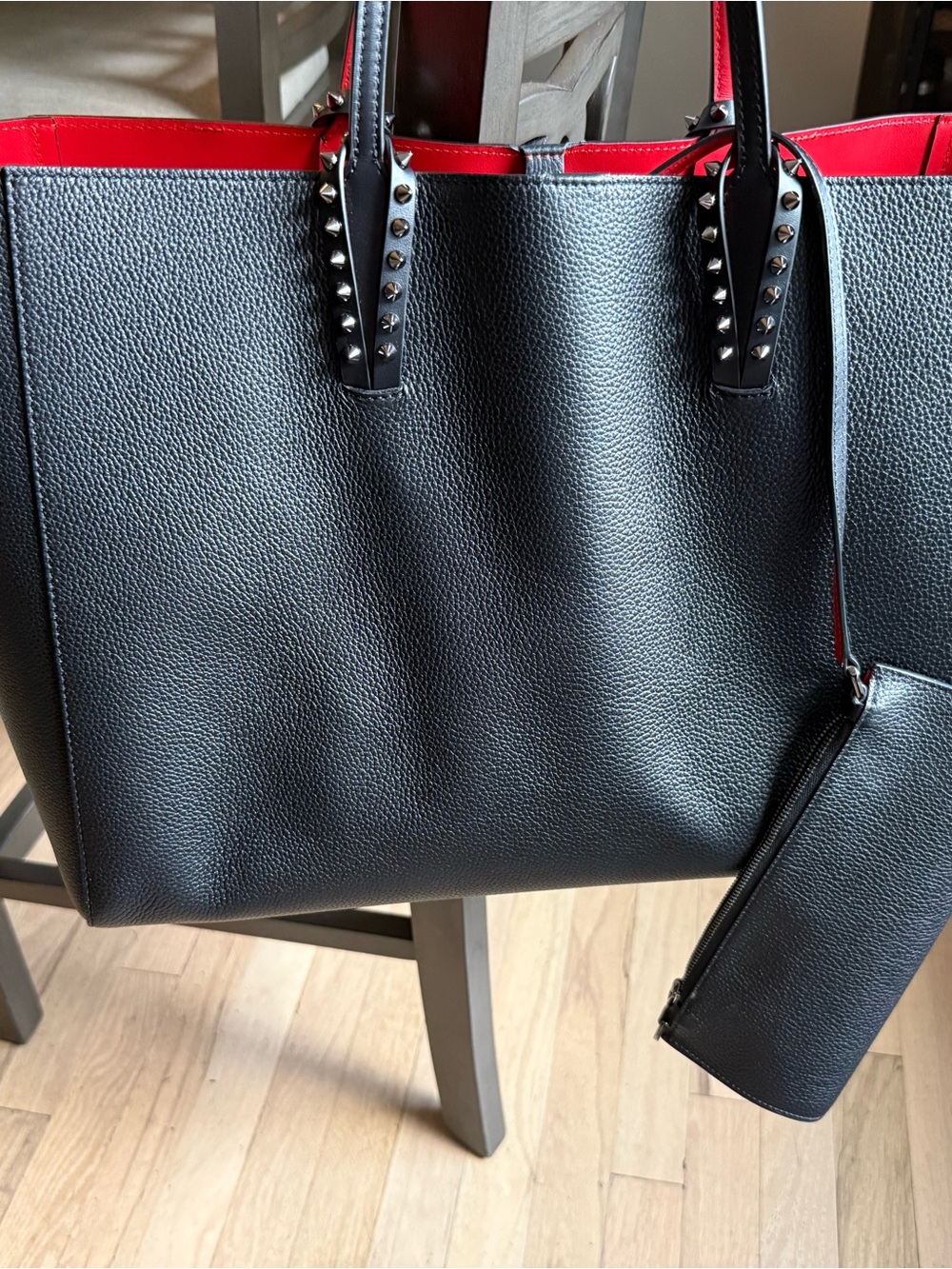 Christian Louboutin Black and Red Stud-Trim Tote Bag with Wrist Pouch.